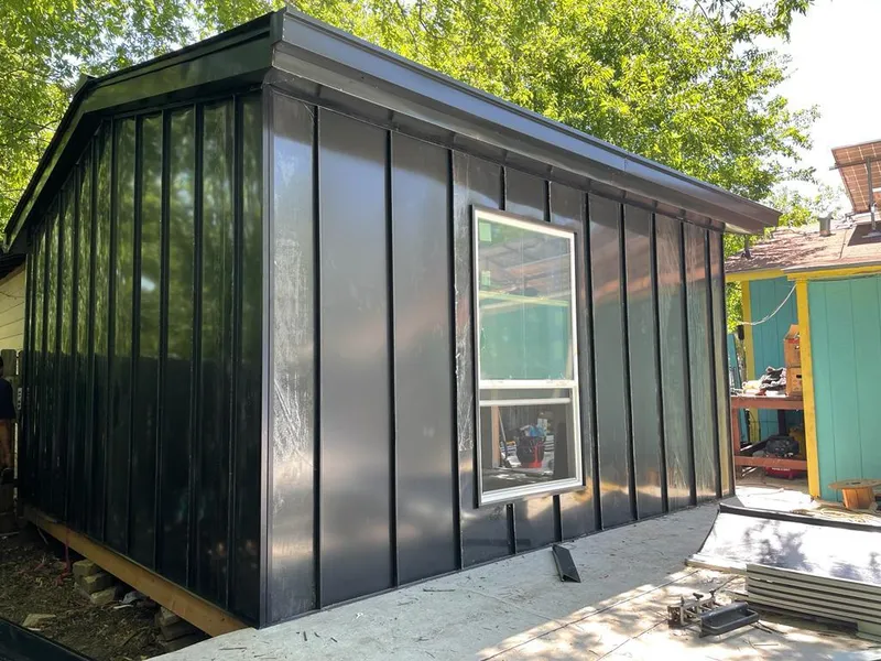 Black standing seam metal wall panels for Roof Inspection in Hailey