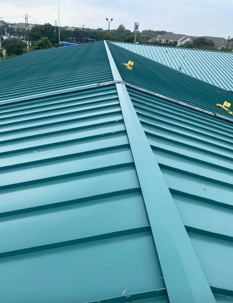 Green commercial metal roof ridge and valley for Metal Roof Repair in Hailey