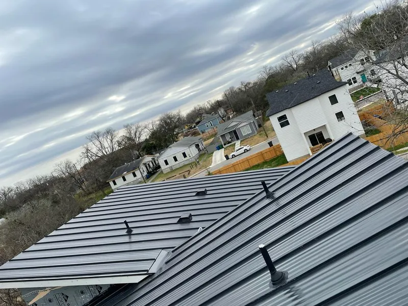 Standing seam metal roof panels with vents for Skylight Repair in Hailey
